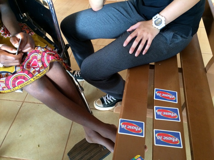 Playing cards with our patient to make treatment more exciting, while working on posture and upper extremity function. 